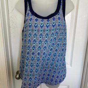 Sleeveless blue print top with zipper back